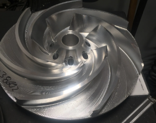 CNC machined aluminum pump impeller with curved blades